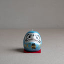 Mini daruma japonés azul