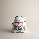 Gato de la suerte japonés blanco maneki neko