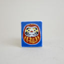 Soporte para palillos Daruma de la buena suerte