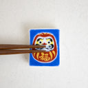 Soporte para palillos Daruma de la buena suerte