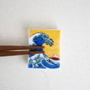 Soporte para palillos La gran ola