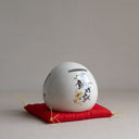 Hucha daruma blanco japonés de 7 cm